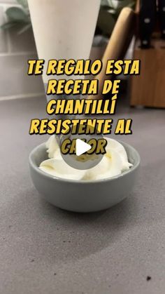 a cup filled with ice cream sitting on top of a counter