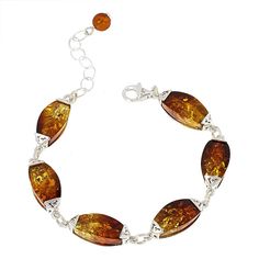 Amber Extraordinaire Sterling Silver Amber Wedge Line Bracelet  Wedge-shaped amber stones encased in beautiful, decorative silver settings, together create an unusual and lovely line bracelet that's a great choice for chic, stylish dressing. Choose Honey, Ombre, Cognac or Green amber.       Small/Medium approx. 6-3/4"L x 3/8"W with 1-1/4" extender; fits 5-1/2" to 6-3/4" wrist     Medium/Large approx. 7-1/4"L x 3/8"W with 1-1/4" extender; fits 6" to 7-1/4" wrist     Stamped .925     Lobster claw Elegant Amber Bracelets For Formal Occasions, Elegant Brown Bracelet Jewelry, Adjustable Amber Bracelet For Formal Occasions, Amber Colored Metal Jewelry, Elegant Brown Sterling Silver Bracelet, Elegant Amber Bangle Jewelry, Elegant Sterling Silver Brown Bracelet, Elegant Amber Bangle Bracelet, Elegant Orange Bangle Jewelry