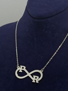 Color: silver Chain: .925 Silver Length: 18 inc (45 cm) Pendant size: 3.5 cm/1.6 cm Material: 925 Sterling Silver Weight:3.50 grams 925 sterling silver , infinity latter silver necklace loved necklace. İt can be to letters Two letters or numbers can be written on this infinite symbol necklace. It has a hard structure. It is resistant to breakage and you can use it for many years. The chain is 925 silver and very sturdy. Infinity Letter Necklace, Infinity Necklace, Personalized Infinity Initial N Silver Infinity Jewelry Gift For Mom, Personalized Infinity Jewelry For Her, Elegant Silver Infinity Name Necklace, Silver Infinity Name Necklace, Silver Engraved Infinity Necklace, Silver Sterling Name Necklace For Mom, Silver Initials Name Necklace For Her, Silver Initials Name Necklace As Gift For Her, Personalized Infinity Silver Jewelry