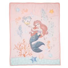 the little mermaid blanket is pink and blue