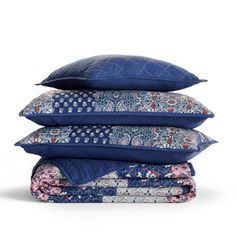 four pillows stacked on top of each other