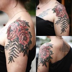 a woman with flowers on her arm and shoulder