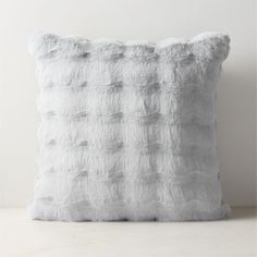 a white pillow on a table