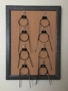 there are several pairs of scissors in a shadow box