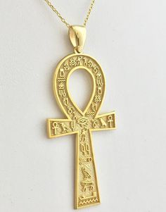 "The Ankh is one of the most recognizable symbols from ancient Egypt, known as \"the key of life\" or the \"cross of life\", and dating from the Early Dynastic Period (c. 3150 - 2613 BCE). It is a cross with a loop at the top sometimes ornamented with symbols or decorative flourishes but most often simply a plain gold cross. The symbol is an Egyptian hieroglyph for \"life\" or \"breath of life\" (`nh = ankh) and, as the Egyptians believed that one's earthly journey was only part of an eternal li Ancient Egypt Jewelry Tutankhamun, Ancient Egyptian Jewelry Danahm 1975, Ancient Egyptian Jewelry Princess, Hieroglyphic Name Necklace, Akasha Necklace, Osiris Necklace, Egypt Ankh, Cartouche Necklace, Ankh Symbol