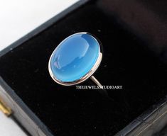 D E T A I L S : => Gemstone              - Blue Chalcedony => Gemstone Shape  - Oval  => Gemstone Size     - 12x16 mm => Metal Type           - 925 sterling silver Feel free to ask me about other color gemstone options . This ring is very easily wearable no matter the style. *             T H E  Q U A L I T Y We use the finest quality and polished gemstones to make high quality, safe and durable jewelry.   As these are natural gemtones which are not all exactly the same so there can be slight in Birthstone Stackable Rings, Elegant Silver Chalcedony Rings, Adjustable Chalcedony Ring, Unique Cabochon Chalcedony Ring, Unique Blue Chalcedony Jewelry, Blue Chalcedony Cabochon Rings, Rings Everyday, Polished Gemstones, Blue Chalcedony Ring