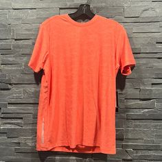 Kenneth Cole T Shirt. It Is Mesh And It Is Moisture Wicking. Small Measurements Center Back Length 27 Inches Chest 40 Inches Xl Measurements Center Back Length 28.50 Inches Chest 47 Inches Sporty Orange Short Sleeve Tops, Orange Athleisure Short Sleeve Tops, Orange Short Sleeve Athleisure Top, Orange Crew Neck Athleisure Top, Sporty Orange Short Sleeve Shirt, Orange Short Sleeve Tops, New York Mens, Light Blue Shorts, Blue T