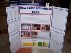 a poster on how color influences taste is displayed in front of other information boards