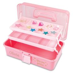 a pink plastic box with three compartments and stars on the top, one is filled with jewelry