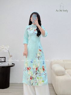 🌻 Stretchy level: 1/10 🌻Material: Gấm xốp 🌻 The measurement of this ao dai (long dress) is in Vietnamese size (American size tends to be bigger for the same size). Please LOOK AT THE SIZE CHART CAREFULLY BEFORE ORDERING. There might have some chalk writings on the fabric due to making process. These marks can be washed away easily. 🌻No returns or exchanges Buyer can contact seller about any issues with an order. 🌸 Follow us Facebook/aodaiemily www.aodaiemily.com 💜 Thank you very much!💜 Spring Ao Dai With Floral Print And Short Sleeves, Spring Floral Print Cheongsam, Fitted Floral Print Ao Dai For Summer, Green Long Ao Dai For Spring, Fitted Ao Dai With Floral Print For Spring, Traditional Maxi Ao Dai For Spring, Traditional Long Sleeve Ao Dai With Floral Print, Traditional Spring Ao Dai In Maxi Length, Traditional Long Sleeve Floral Ao Dai