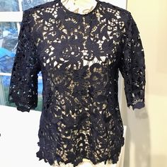 Make An Offer Gorgeous Blouse From Zara Never Worn! Nwot Excellent Condition! No Rips, Stains, Flaws, Etc. Navy Blue Crew Neckline Keyhole Opening In Back, Secured W/ Small Button Uneven Hemline Slanted 3/4 Length Sleeves Chic Zara Crochet Lace Top, Blue Lace Blouse For Spring, Blue Lace Blouse With Lace Trim, Elegant Zara Crochet Top For Spring, Chic Blue Blouse With Lace Top, Chic Blue Lace Top Blouse, Lace Tops For Summer Workwear, Elegant Navy Tops For Spring, Blue Lace Top For Summer