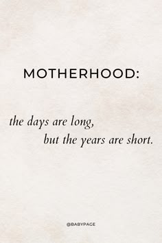 the words motherhood are written in black and white