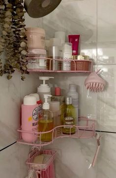 the bathroom shelves are filled with various items