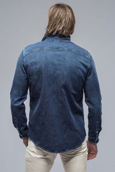 We have for years been searching for a fabric to create the perfect Axel's denim shirt; one with enough stretch for comfort, and a beefy, not 'boardy' look and feel. Finally, we've found exactly what we'd been searching for... but better! Individually dyed, washed and vintaged by Italian artisans, the Roper denim snap shirt features profound Western inspiration, but with a precision that only the Italians can accomplish with clothing. 94% cotton, 6% elastane [Stretch Denim] Pearlized Snaps Weste Western Inspiration, Athletic Build, Cashmere Jacket, Create Shirts, Mock Turtleneck, Sweater Pants, Shearling Jacket, Western Shirts, Premium Denim