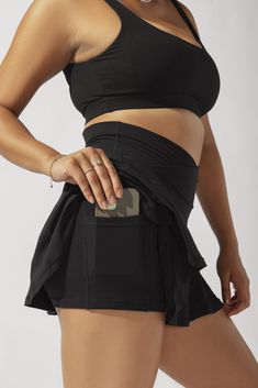 Our most curve-accentuating skort designed for endless twirls and booty shakin’. Meet your newest wardrobe staple. Compression Level: Performance Level: Fitted Black Skort With Wide Waistband, Black Fitted Skort With Wide Waistband, Fitted Black Bottoms With Crossover Waistband, Black Stretch Skort For Workout, Versatile Stretch Skort, Black Skort With Wide Waistband, Chic Black Stretch Activewear, Stretch Black Workout Skort, Versatile Workout Skort