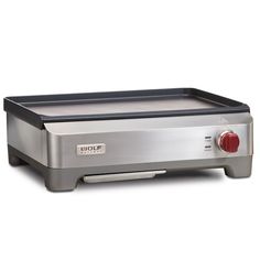 an electric griddle grill with red knobs on the front and side burners