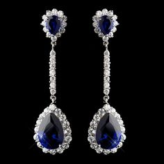 Sapphire CZ Crystal Drop Wedding and Prom EarringsAdd a glamorous pop of color to your wedding or formal event with these gorgeous earrings. These stunning silver plated drop earrings sparkle with clear and sapphire blue cz crystals.Size: 2" Long and 1/2" wide.Color: Silver/Sapphire blue/Clear.Style: e7244.This would be a fabulous accessory for your bridesmaids, the mother of the bride or groom, your quinceanera or for any special occasion!Need several pair of earrings for your bridal party? You Sapphire Blue Earrings, Heart Diamond Earrings, Winter Wedding Accessories, Boho Bridal Jewelry, Pageant Earrings, Formal Earrings, Blue Crystal Earrings, Wedding Earrings Drop, Prom Earrings