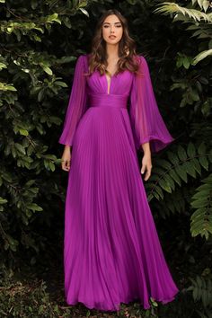 You'll love twirling around in this pleated long bell sleeve dress with A-line skirt. This chiffon gown is pleated from sleeve to hem and gathered at the deep V-neckline and waist. An open mid back has a center back zipper closure. Flowy Pleated Long-Sleeve Chiffon Gown Deep V-neck illusion bodice with bell sleeves Open V-back Floor length A-line skirt Details: Bra Cup, Fully Lined Fit: The model is 5'8" and is wearing 4" heels Occasions: Prom, Red Carpet, Gala, Wedding Guest, Debutante Ball, Mi Sukienki Maksi, Unique Formal Dresses, Cinderella Divine, Deep V Neck Dress, Prom Ball Gown, Evening Dresses With Sleeves, Unique Prom Dresses, Long Sleeve Gown, Pleated Chiffon