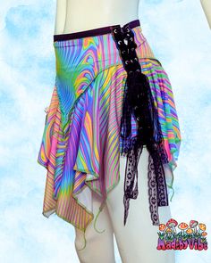 Get ready to shine in our Dark Prismatic Fairy Skirt! This playful skirt features flowing layers of rainbow fabric, an elastic waistband, and lace up sides. Comfortable and flattering, it's perfect for raves, festivals, or a summer day. Get your fairy style on and stand out from the crowd! Pattern placement may vary Made to Order Fairy Skirt Pattern, Asymmetrical Skirt Pattern, Velvet Swimwear, Rainbow Fabric, Sewing Tricks, Fairy Skirt, Fairy Style, Fairy Fashion, Asymmetrical Skirt