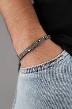 Introducing our Men's Colorfast Natural Stone Bracelet - a perfect blend of style and durability. Crafted with precision, this bracelet features genuine natural stones that not only add a touch of sophistication but also offer timeless elegance. What sets it apart is its colorfast technology, ensuring the vibrancy of the stones remains intact, resisting fading over time. The sturdy construction and adjustable fit make it a versatile accessory for any occasion, adding a masculine and refined touch to your look. Elevate your style with the enduring charm of our Men's Colorfast Natural Stone Bracelet. Modern Hematite Bracelets As A Gift, Adjustable Hematite Bracelets, Adjustable Magnetic Minimalist Jewelry, Minimalist Magnetic Adjustable Jewelry, Minimalist Magnetic Jewelry, Silver Minimalist Magnetic Bracelet, Minimalist Silver Magnetic Bracelet, Minimalist Magnetic Silver Bracelet, Bracelets Design