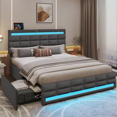 a bedroom with a large bed and blue lights on the headboard