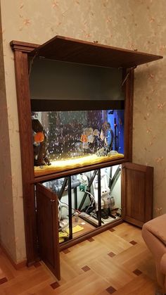 a fish tank in the corner of a room