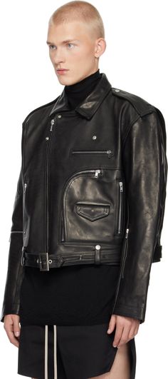 Heavyweight grained horse leather jacket. · Press-stud fastenings at notched lapel · Offset zip closure · Flap pocket and zip pockets · Pin-buckle belt and belt loops at cropped hem · Epaulets · Zip pockets at sleeves · Zip expansion panel at cuffs · Zip pocket at interior · Full twill lining Supplier color: Black Luxury Leather Biker Jacket With Concealed Fastening, Luxury Biker Jacket With Concealed Fastening, Luxury Leather Biker Jacket With Pockets, Edgy Leather Jacket With Belt Loops For Work, Designer Leather Jacket With Belt, Luxury Leather Outerwear With Belt Loops, Designer Belted Leather Jacket, Leather Outerwear With Rivets For Biker Events, Business Leather Jacket With Belt Loops