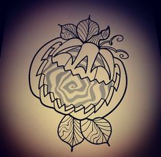 a drawing of a pumpkin with leaves and swirls on it's face is shown