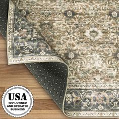 an area rug is shown with the name usa on it and has a wooden floor