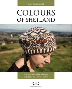 a woman wearing a knitted hat with the words colours of shetland on it