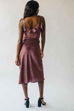 Get ready to turn heads in the Tragis Satin Ruffle Midi Dress. This chestnut-colored dress features luxurious satin fabric with ruffle detailing, making you feel elegant and sophisticated. Perfect for any special occasion, this dress will make you feel like a star. Details self/lining: 100% polyester Fabric Care Guide Here Sizing & Fit Measurements are approximate and taken while laying flat across the front. Not doubled. small: bust = 16"; waist = 14"; length = 47" medium: bust = 17.5"; waist = Luxury Elegant Midi Dress With Ruffles, Luxury Elegant Midi Ruffle Dress, Luxury Midi Length Ruffle Dress, Luxury Fitted Satin Dress With Ruffles, Luxury Fitted Satin Midi Dress, Luxury A-line Midi Dress With Ruffles, Luxury Ruffle Midi Dress, Ruffle Midi Dress, Waffle Knit Sweater