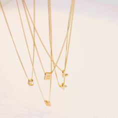 A perfect personalized piece. Add any initial of your choice to our delicate gold chain. This is the perfect gift idea for your best friend, sister, mother and daughter. …………………………………. Details: Available in Gold Plated Curb Chain Pendant is Matte Gold Plated measuring 5 x 7.5mm Size inclusive and made to order just for you Not waterproof Average necklace length is 18" About Your Jewelry If you are not wearing your jewelry it is best to store it in a cool, dry place such as your gift box that is Trendy Name Necklace Pendant Gift, Trendy Name Pendant Necklace As Gift, Trendy Pendant Name Necklace As Gift, Trendy Personalized Everyday Charm Necklace, Trendy Initial Pendant Necklace With Delicate Chain, Trendy Personalized Necklace For Gift, Trendy Initial Pendant Charm Necklaces, Trendy Charm Necklace With Chain As A Gift, Trendy Custom Name Charm Necklaces For Gifts