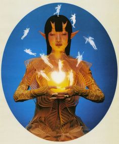 a woman holding a lit candle in her hands