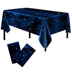 an image of a table cloth with blue stars on it and space in the background