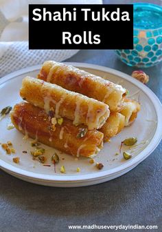 some food on a white plate with the words shari tukka rolls above it