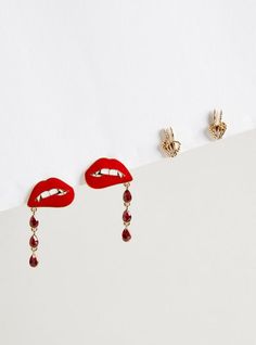 FIT Measures 0. 37” x 0. 59” and 0. 9” x 1. 55” . MATERIALS + CARE Base metal. Imported. DETAILS High shine finish. . Set of 2 pairs. Vampire details. . The best plus size women's vampire lips earring pack earrings in multi. Torrid is your destination for cozy fall and winter clothes to keep you warm and comfortable. Summer Skating, Black Beachwear, Earring Pack, Kimono Shrug, Vampire Lips, Glow Forge, Skater Shirts, Earring Ideas, Summer Lookbook