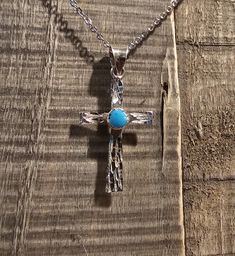 Very pretty unique handcrafted Diamond cut Sterling Silver cross necklace with turquoise setting. 18" stainless steel chain. Turquoise Stainless Steel Jewelry As A Gift, Turquoise Stainless Steel Jewelry As Gift, Turquoise Stainless Steel Jewelry Gift, Spiritual Turquoise Necklace With Cross Pendant Gift, Spiritual Turquoise Cross Pendant Necklace Gift, Turquoise Cross Pendant Necklace For Gift, Spiritual Cross Turquoise Necklace For Gift, Spiritual Turquoise Cross Necklace As Gift, Spiritual Turquoise Cross Necklace For Gift