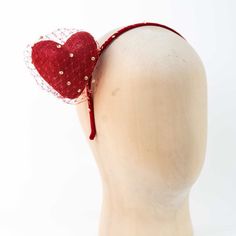 A delightful , striking red sinamy fascinator set on a velvet headband enhanced by red veiling. The focal point of this unique design is a beautifully shaped sinamay heart adorned with delicate gold sequins and  matching veiling. Sweet and charming, this headpiece is as light as a feather. It is not only a perfect Valentines Day statement accessory but as well a charming bridesmaid fascinator. It would work with almost any summery outfit and flatter its wearer, whether it is a cocktail party, a Red Headband Fascinator For Formal Occasions, Red Adjustable Fascinator For Party, Bridesmaid Fascinator, Heart Fascinator, Red Adjustable Brimmed Fascinator, Red Spring Headband Fascinator, Bridesmaid Headpiece, Summery Outfits, Red Cocktails