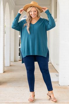 In this top, you'll never miss last year's wardrobe! This sweater has a chic teal color you can dress up or down and style with everything in your closet! It's comfortable for all day wear, has a figure-flattering fit, and can be layered with your favorite outerwear! Simply, style this sweater with skinnies and heels for an effortlessly chic look! 50% Viscose, 28% Nylon, 22% Polyester Long Sleeve Turquoise Tops For Fall, Turquoise Long Sleeve Tops For Fall, Teal Color, Teal Colors, Tunic Tops, Dress Up, Wardrobe, Heels, Women's Top