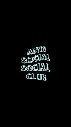 the words anti social social club are lit up in green on a black background with white lettering