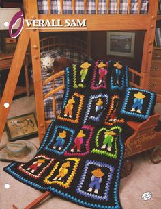 a crocheted blanket sitting on top of a wooden chair next to a rocking chair