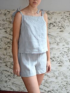 "This fabric is certified Oeko-Tex Standard 100 03.0.4362. LIGHT GREY handmade washed linen Summer woman's Pajama top and shorts. A cozy pajama top with regulating straps. SELECT SIZE: XS Bust 82 - 84 cm. ( 32 1/4\" - 33\") Waist 66 - 68 cm. / (26\" - 26 3/4\") Hips 90 - 92 cm. / (35 1/2\" - 36 1/4\") S Bust 86 - 88 cm. ( 33 3/4\" - 34 3/4\") Waist 70 - 72 cm. / (27 3/4\" - 28 1/4\") Hips 94 - 96 cm. / (37\" - 37 3/4\") M Bust 90 - 92 cm. ( 35 1/2\" - 36 1/4\") Waist 74 - 76cm. / (29 1/4\" - 30\ Summer Gray Linen Top, Summer Linen Sleep Tops, Summer Linen Sleepwear For Relaxation, Relaxed Linen Top For Relaxation, Relaxed Fit Linen Tops For Relaxation, Linen Relaxed-fit Sleep Tops, Linen Pajama Set, Linen Sleepwear, Linen Pajamas