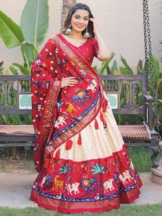 Design and pattern could be at the rise of your beauty after you dress in this marvelous red digital printed dola silk festive wear lehenga choli. This stunning set will surely brighten up your festive occasions, Navratri, receptions, weddings, and other events where you want to stand out from the crowd.
Crafted with utmost perfection, this lehenga choli set is designed to make you feel like a style icon. It features a red printed dola silk lehenga with foil work that has an impressive 4-meter f Red Color Lehenga, Red Lehenga Choli, Party Wear Lehenga Choli, Lehenga Choli Online, Red Lehenga, Party Wear Lehenga, Bridal Lehenga Choli, Festive Wear, Silk Lehenga