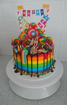 Rainbow drip cake Cake With Candy On Top, Candy Drip Cake, Rainbow Candy Cake, Rainbow Drip Cake, Gökkuşaği Pasta, Puppy Birthday Cakes, Candy Birthday Cakes, Rainbow Birthday Cake, Dog Birthday Cake