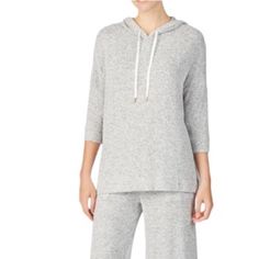 Super Comfy And Cute Medium Donna Karan Grey Loungewear Set. The Top Is 3/4” Sleeves With A Drawstring Hood And Small Slits On Each Side. The Bottoms Are Also Cropped Into Capris, Has Pockets, And A Drawstring. This Set Is So Incredibly Soft. You Can Wear It Lounging Or Running Errands! *New Without Tags! And In Perfect Condition! Cozy Stretch Top With Drawstring Hood, Cozy Stretch Tops With Drawstring Hood, Cozy Spring Hoodie For Lounging, Cozy Hoodie For Spring Lounging, Cozy Hoodie For Lounging In Spring, Cozy Spring Lounging Hoodie, Cozy Stretch Hoodie For Loungewear, Cozy Fit Tops With Drawstring Hood For Loungewear, Cozy Fit Lounge Tops With Drawstring Hood