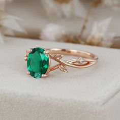 Elevate your love with our Oval Cut Lab Emerald Engagement Leaf Ring in 14K Rose Gold. This exquisite ring features a mesmerizing lab-created emerald, gracefully set in a rose gold leaf-inspired band. Emerald Ring Designs For Women, Emerald Engagement Ring Green, Rose Gold Promise Ring, Gold Promise Ring, Emerald Rings, Leaf Engagement Ring, Emerald Ring Gold, Gold Promise Rings, Fairy Princess