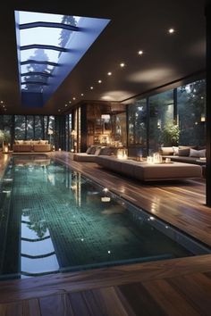 an indoor swimming pool in a modern home