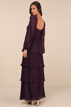 Let everyone be impressed by your stunning style in the Lulus Impactful Elegance Purple Tiered Balloon Sleeve Maxi Dress! Airy, lightweight woven fabric shapes this gorgeous dress that has long balloon sleeves with elastic at the cuffs and shoulders. Sweetheart neckline tops a pleated bodice with a ruched detail at the front and a fitted waist. Accordion-pleated skirt falls in graceful tiers to a maxi hem. Hidden zipper/clasp at back. Fit: This garment fits true to size. Length: Floor length. Si Elegant Tiered Gown For Prom Season, Fitted Tiered Gala Gown, Fitted Tiered Gown For Gala, Formal Evening Dress With Fitted Bodice And Tiered Shape, Chiffon Long Sleeve Gala Gown, Chiffon Long Sleeve Gown For Gala, Long Sleeve Chiffon Gown For Gala, Festive Tiered Wedding Dress, Elegant Tiered Maxi Dress For Wedding Guest