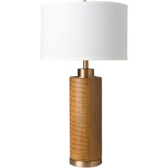 a table lamp with a white shade on the top and a gold base, in front of a white background