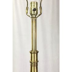 an old fashioned brass lamp on a white background